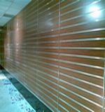 Cherry slatboard with Aluminum Border on the wall